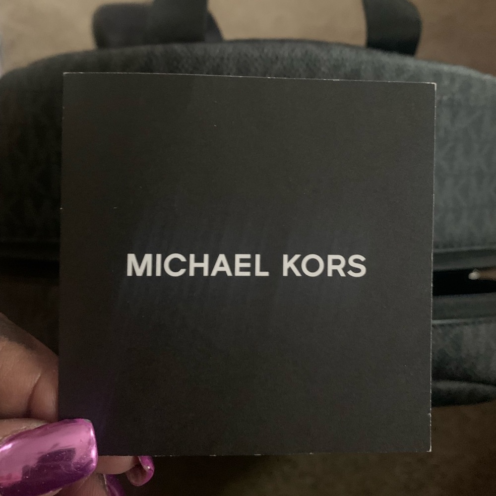 MK unisex Backpack.. 3 months old, worn only once.